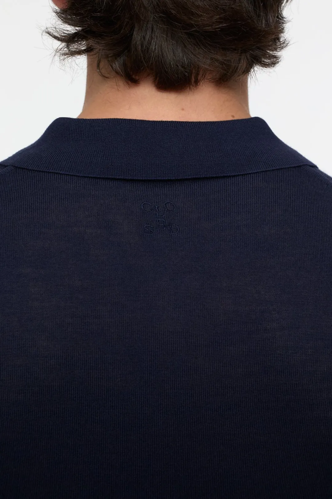 Closed Polo jumper made from organic wool Dark night Hot
